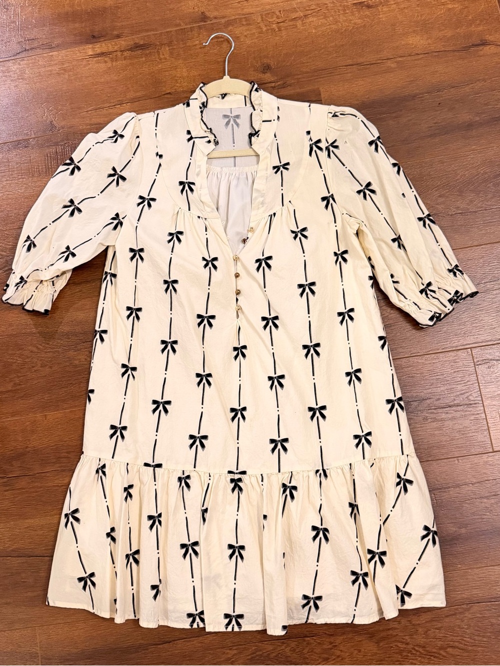 Women’s Cream Bow-Print Ruffle Hem Dress